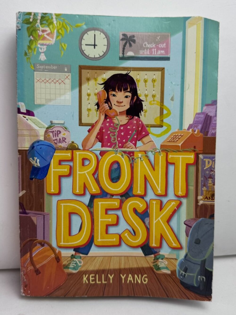 Front Desk by Kelly Yang Paperback Book Scholastic Edition Writing on Back